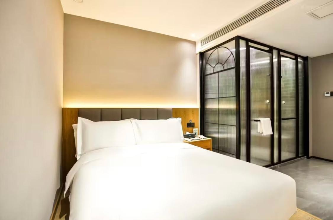 True Go Hotel - Shanghai Jing'An Temple Nanjing West Road Esterno foto